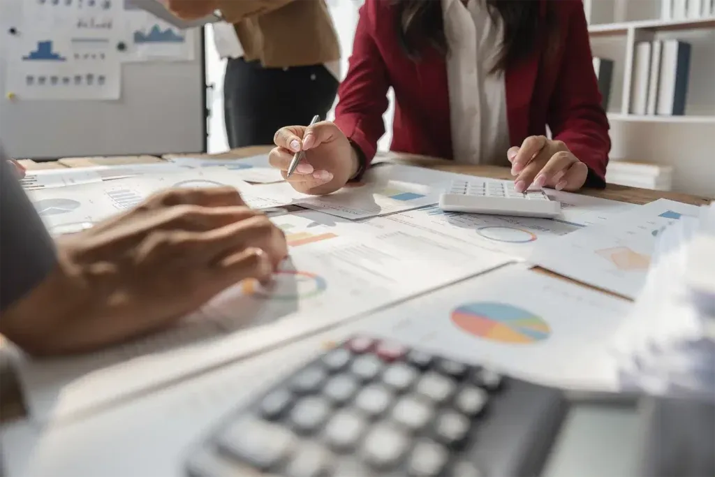 Accounting documents being reviewed.